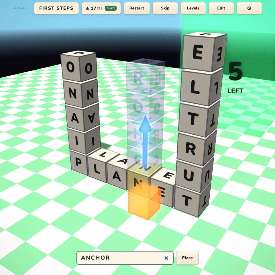 The game screen with a cube selected, a blue arrow pointing up and a ghost preview of the word ANCHOR above it